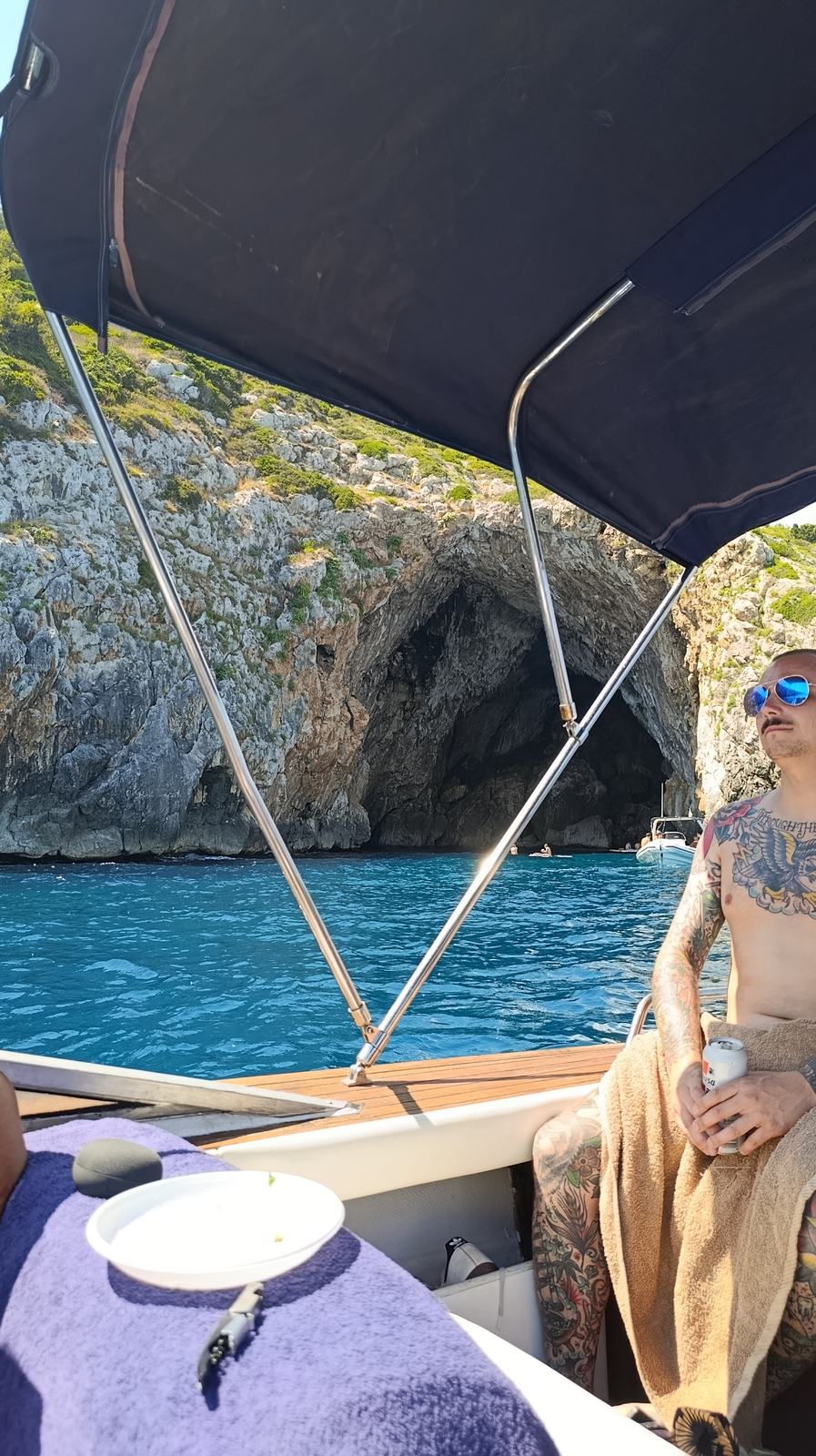 Moritz on the boat near the entrance of Grotta del Laghetto, a sea cave near Santa Maria di Leuca